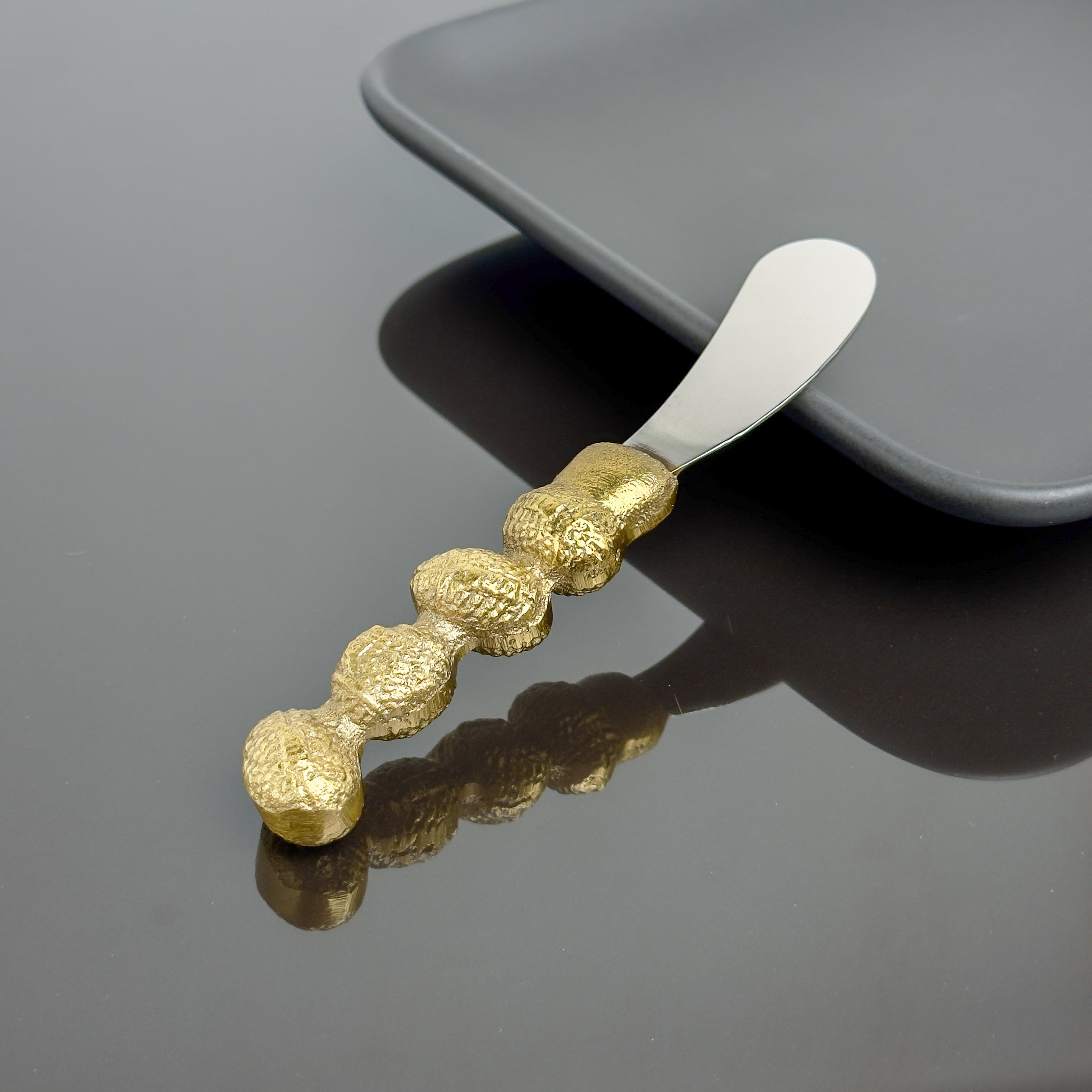 Gold Football Spreader