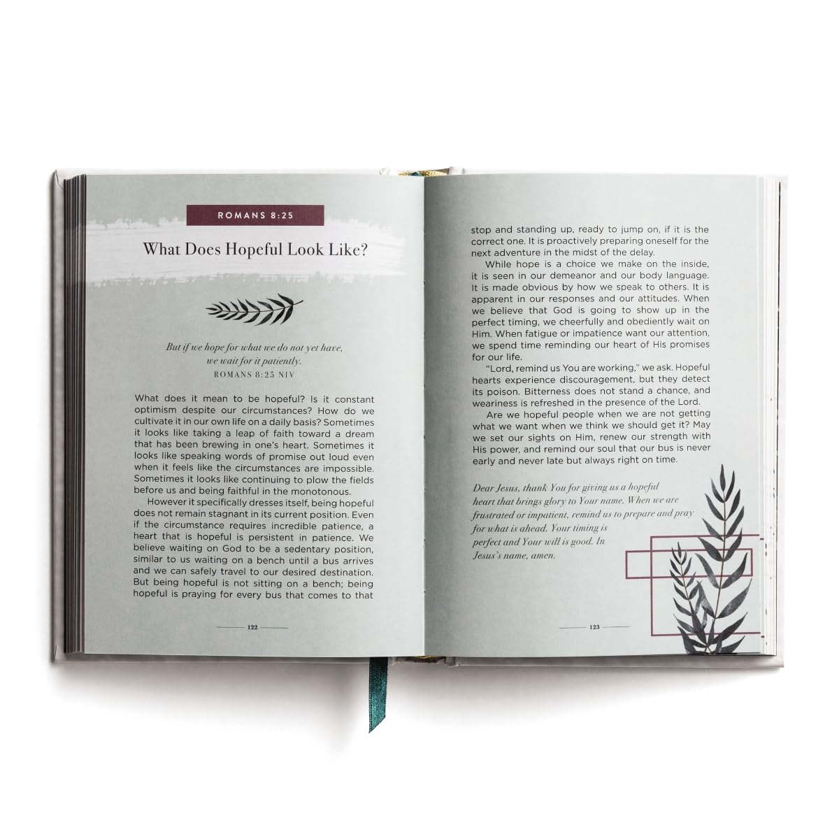Open book with text and decorative elements on a white background