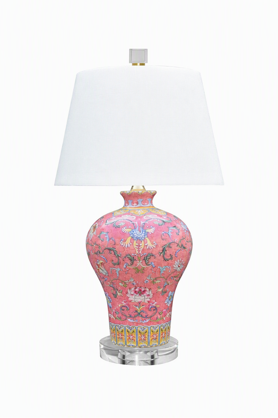 A table lamp with a pink porcelain-style vase base decorated with multicolored floral and scroll patterns, a white tapered lampshade, and a clear acrylic round base, shown on a white background.