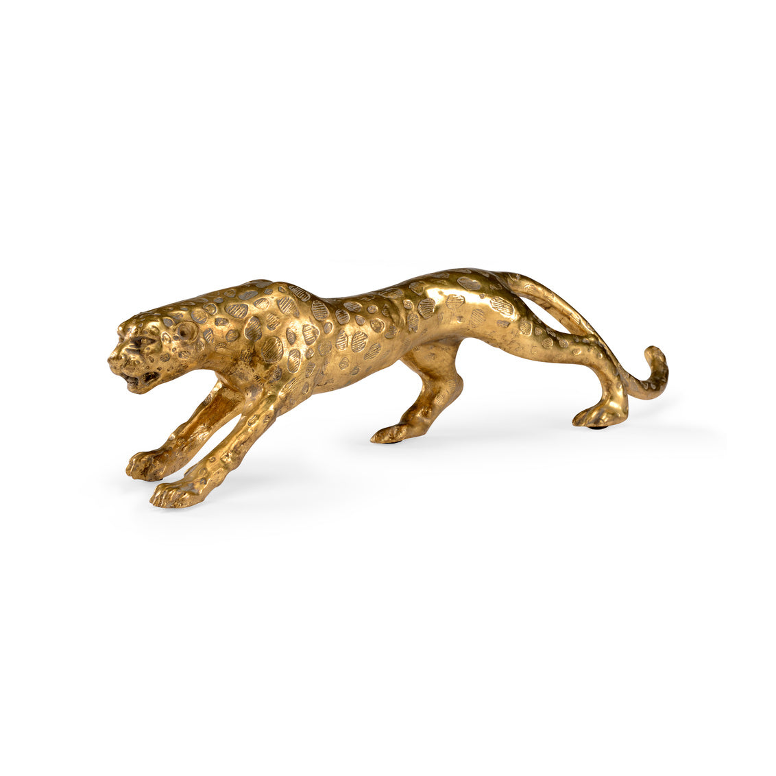 Gold leopard figurine on a white background