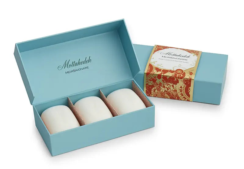 Molton Brown soap set in a blue box on a white background