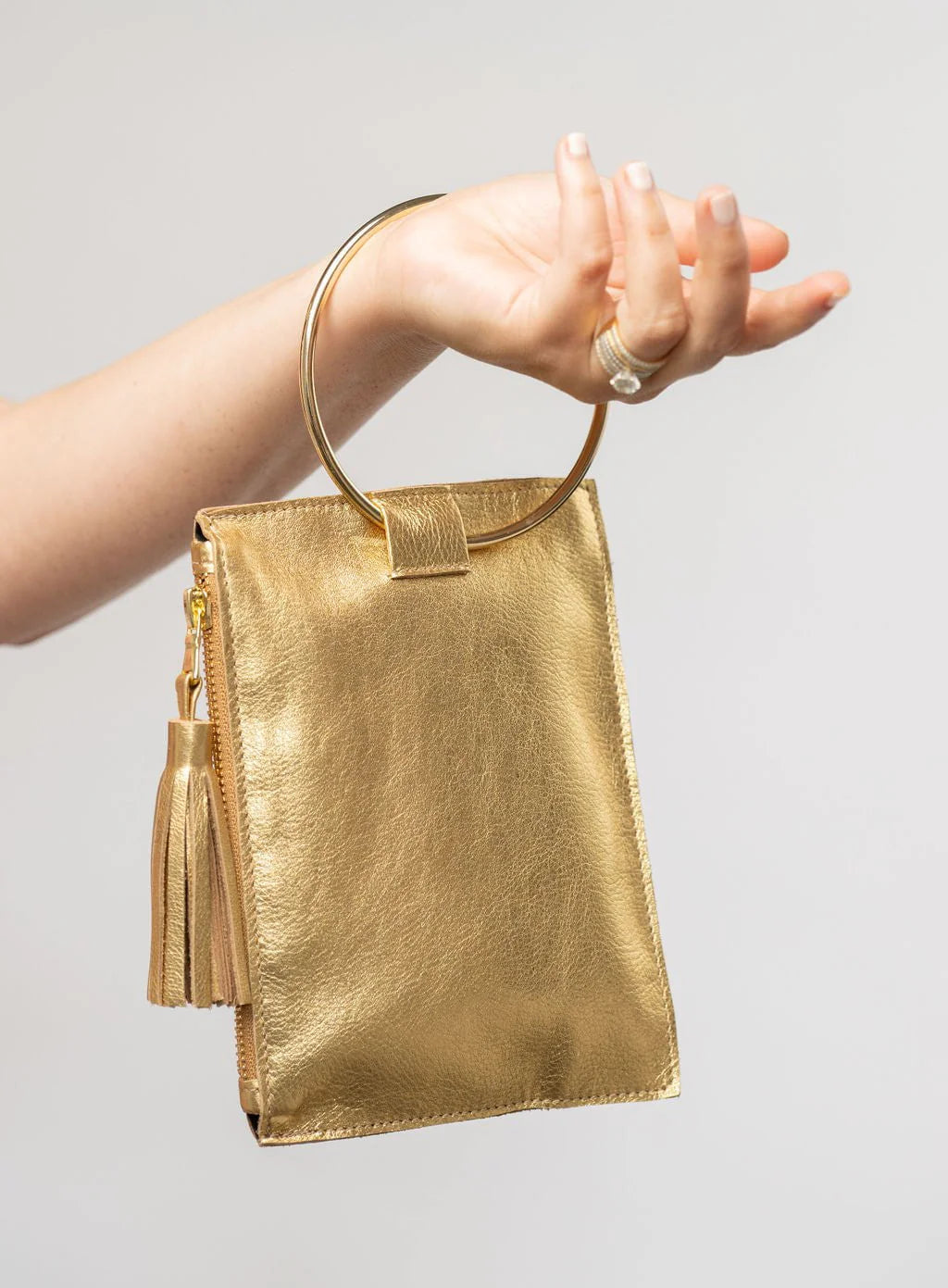 The Metal Ring Wristlet | in Metallic Gold