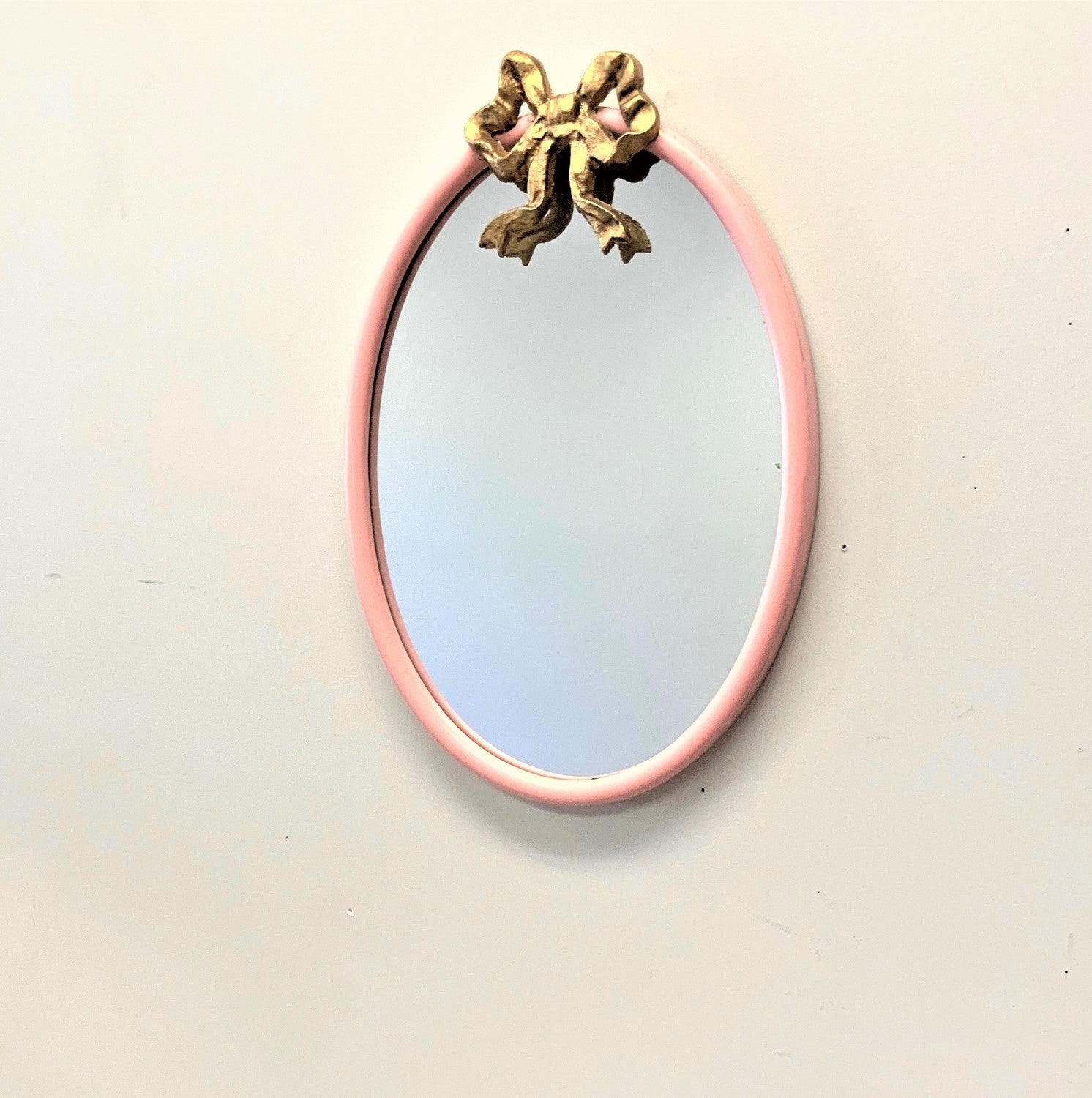 Oval Pink Mirror with Iron Bow