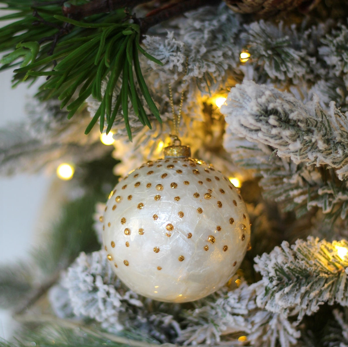 Gold and White Capiz Glittered Dotted Ball Ornament