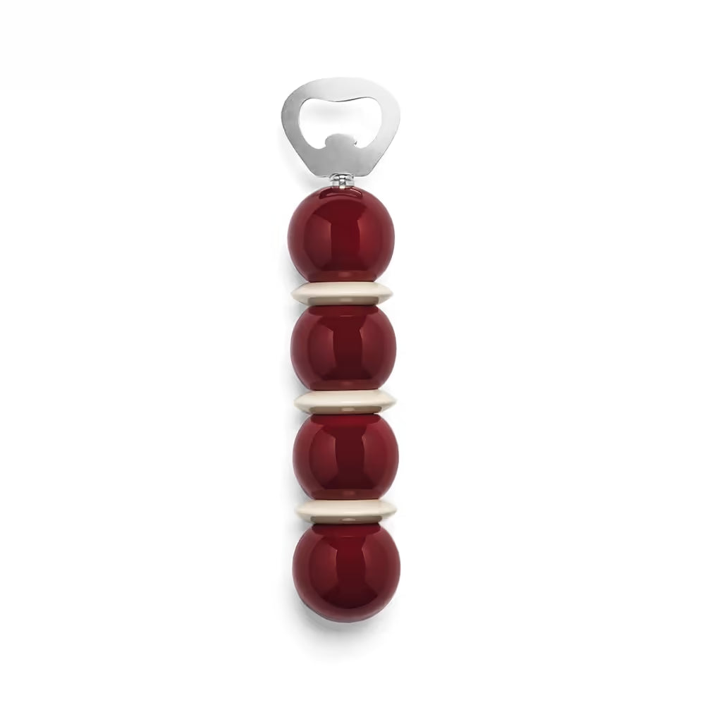 Bottle opener with red and white design on a white background