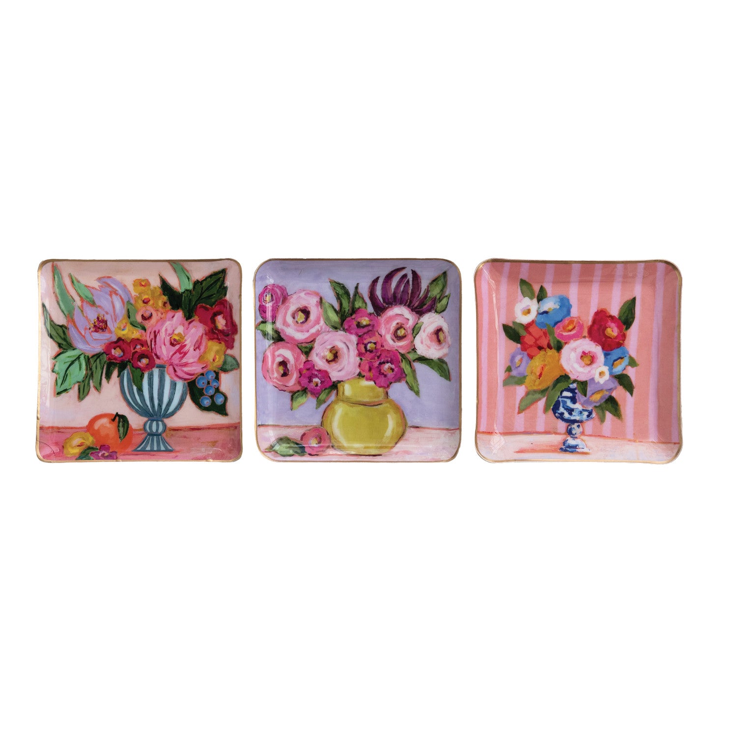 Three decorative trays with floral designs on a white background