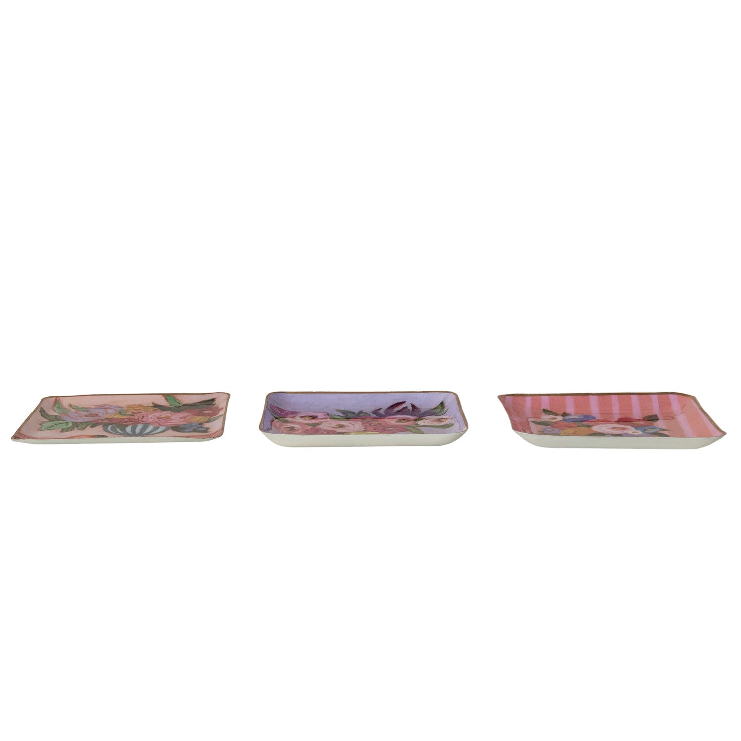Three decorative trays with floral and checkered patterns on a white background