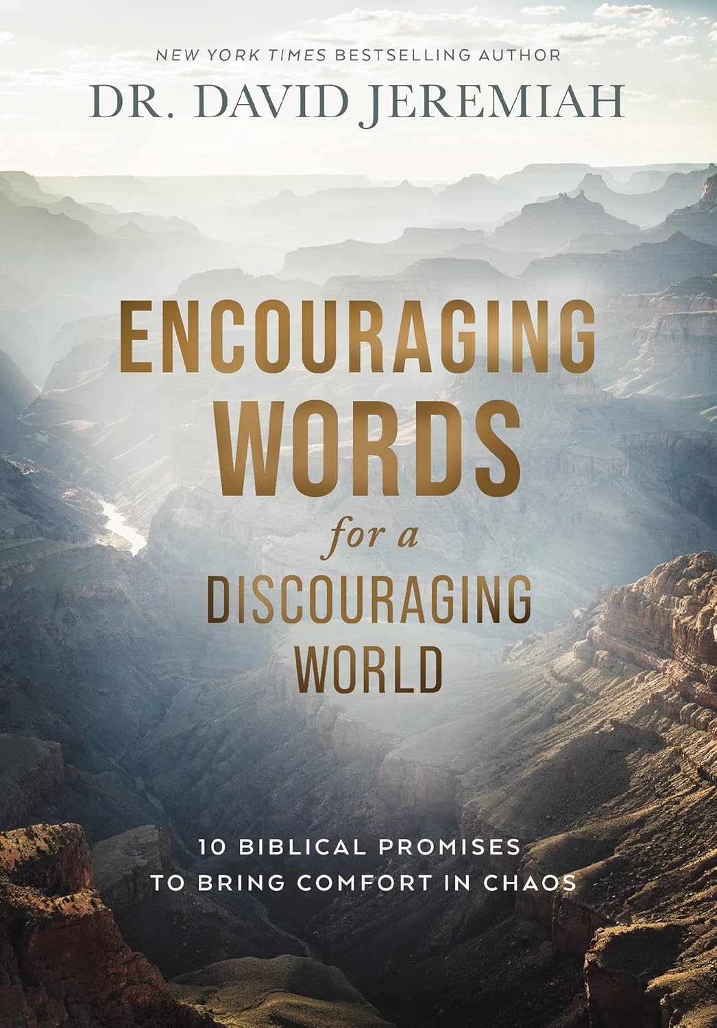 Book cover with mountainous landscape and text about encouraging words for a discouraging world