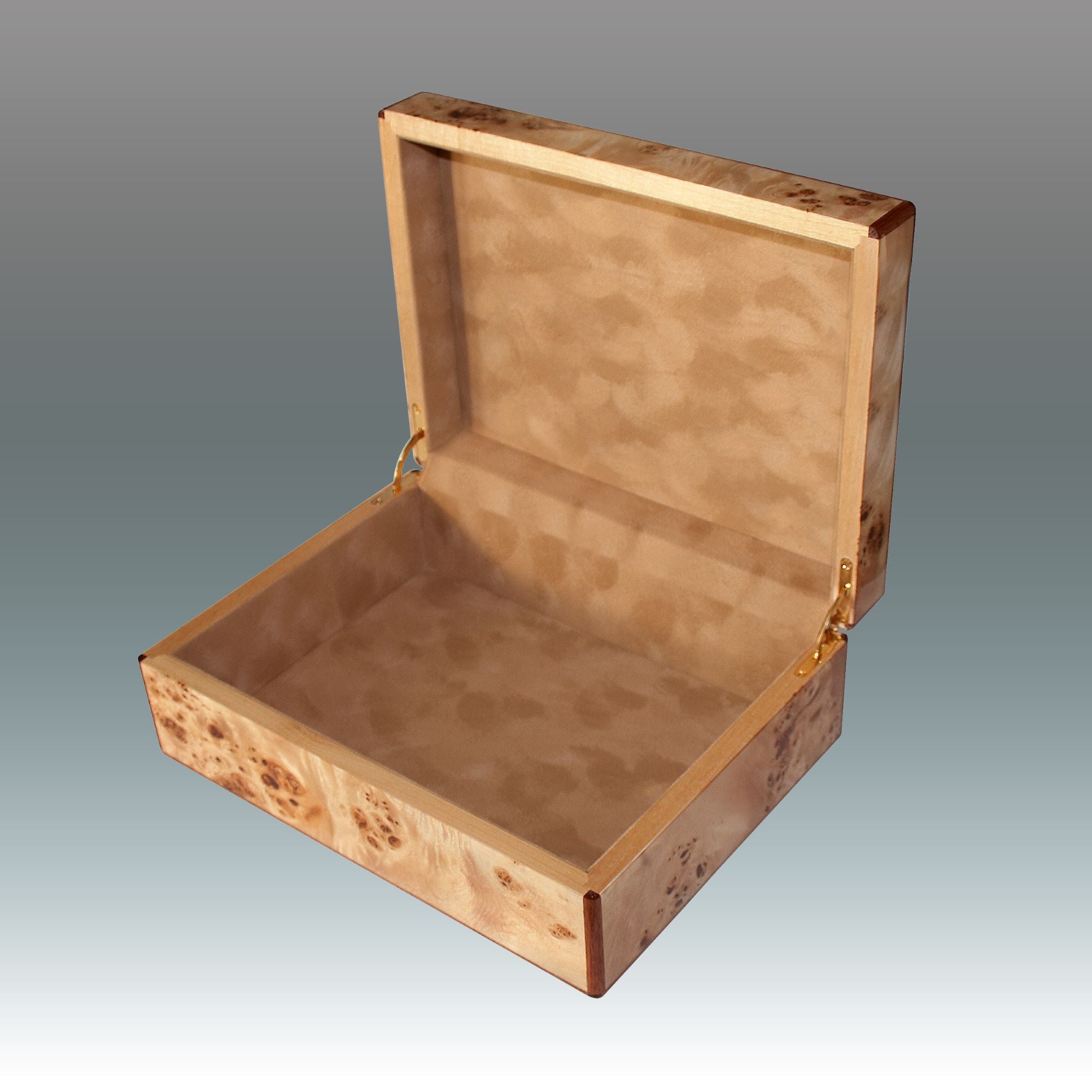 Wooden jewelry box with a gray gradient background