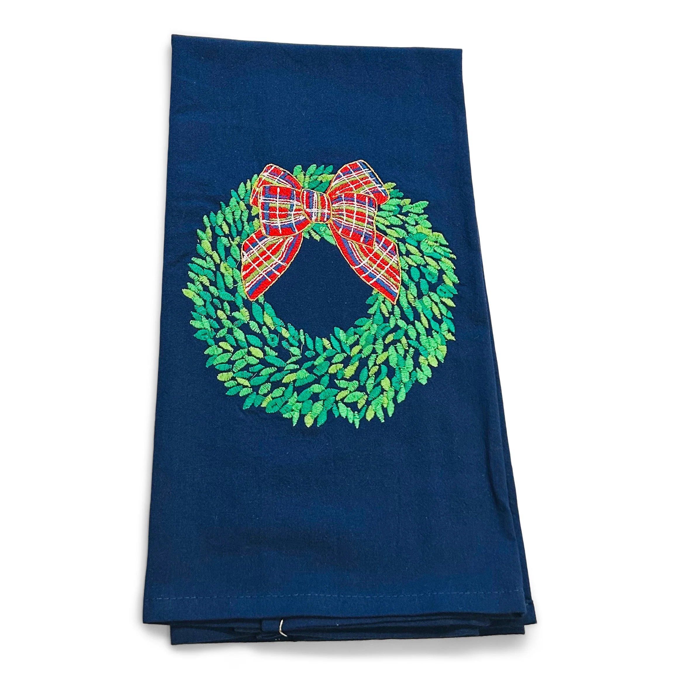 Boxwood Wreath with Red Bow on Navy Towel