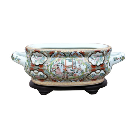 Decorative ceramic bowl with intricate patterns on a white background