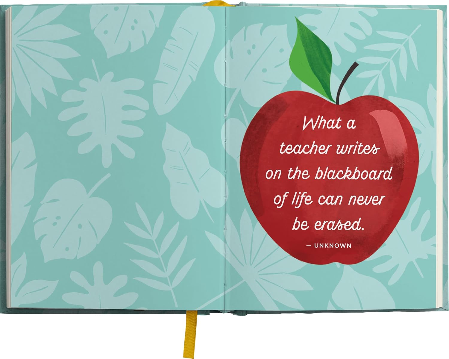 Book with a red apple illustration and a quote on a green leafy background