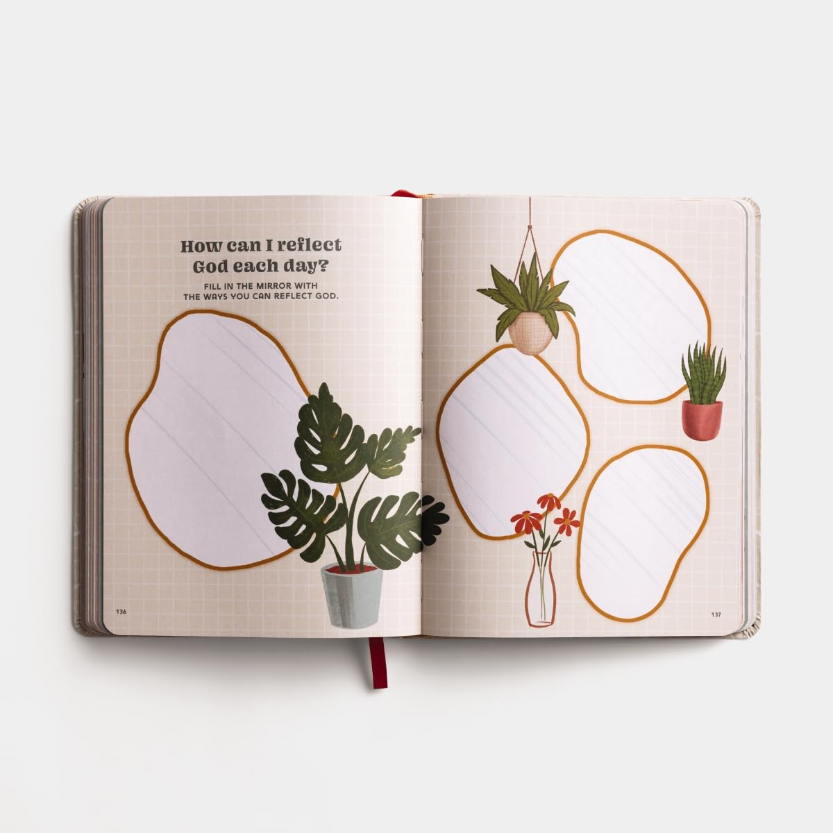 Open book with plant illustrations and text on a white background